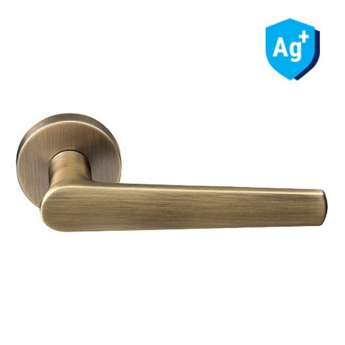 Межкомнатная дверная ручка Archie Sillur на круглой накладке ESCUDO ANT.BRONZE античная бронза Межкомнатная дверная ручка Archie Sillur на круглой накладке ESCUDO ANT.BRONZE античная бронза