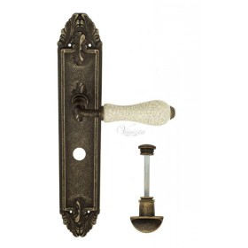 Дверная ручка Venezia COLOSSEO белая керамика паутинка WC на планке PL90 античная бронза Дверная ручка Venezia COLOSSEO белая керамика паутинка WC на планке PL90 античная бронза