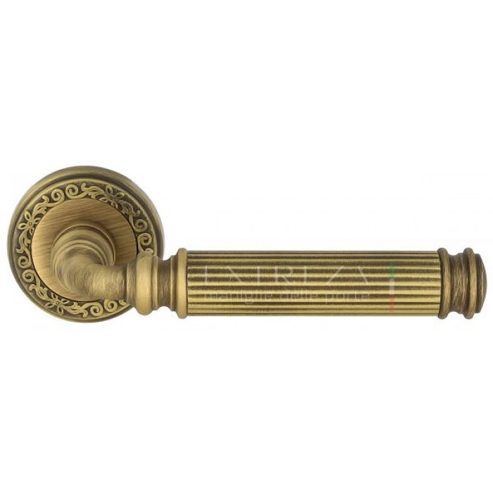Дверная ручка Extreza BENITO (Бенито) 307 на розетке R06 матовая бронза F03