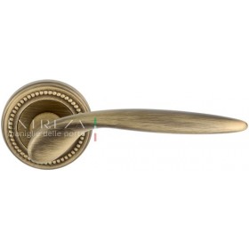 Дверная ручка Extreza CALIPSO (Калипсо) 311 на розетке R03 матовая бронза F03