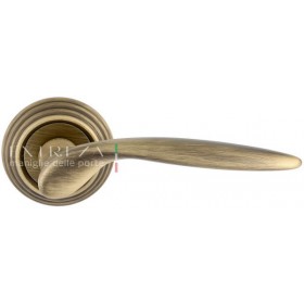 Дверная ручка Extreza CALIPSO (Калипсо) 311 на розетке R05 матовая бронза F03