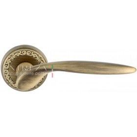 Дверная ручка Extreza CALIPSO (Калипсо) 311 на розетке R06 матовая бронза F03