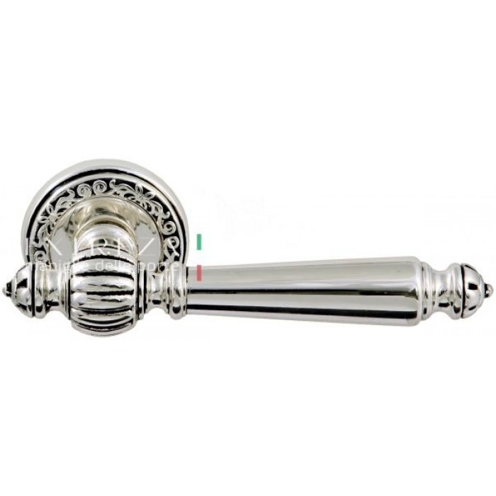 Дверная ручка Extreza DANIEL (Даниел) 308 на розетке R06 натуральное полированное серебро + черный F24