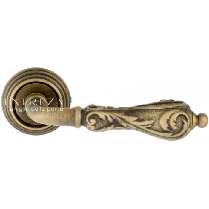 Дверная ручка Extreza GRETA (Грета) 302 на розетке R05 матовая бронза F03