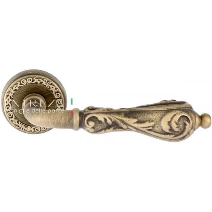 Дверная ручка Extreza GRETA (Грета) 302 на розетке R06 матовая бронза F03