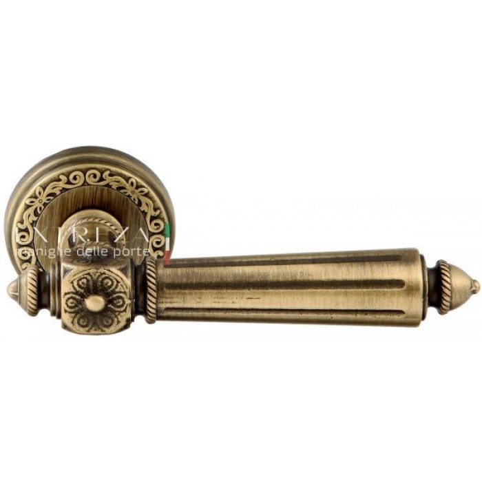 Дверная ручка Extreza LEON (Леон) 303 на розетке R06 матовая бронза F03
